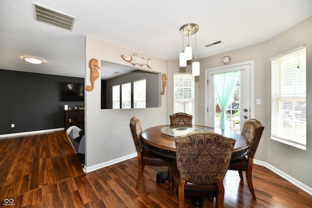 10539 Ross Xing, Fishers, IN 46038 - dining space featuring wood finished floors and plenty of natural light