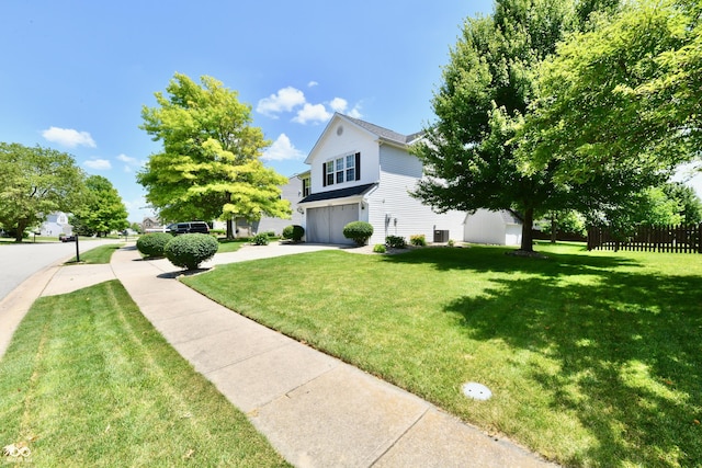 10539 Ross Xing, Fishers, IN 46038 - view of side of property featuring a garage and concrete driveway