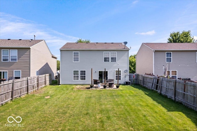 9497 W Stargazer Dr, Pendleton, IN 46064 - back of house with a fenced backyard and a patio area