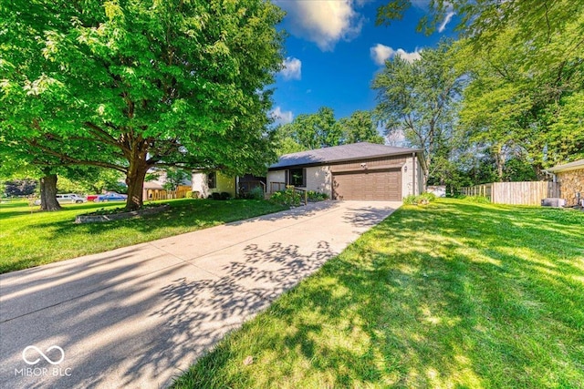 11 N Restin Rd, Greenwood, IN 46142 - view of front of home with an attached garage and concrete driveway