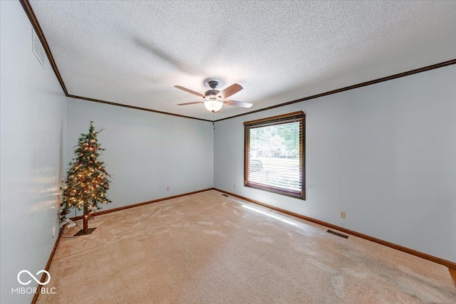11 N Restin Rd, Greenwood, IN 46142 - carpeted empty room with crown molding, a ceiling fan, and a textured ceiling