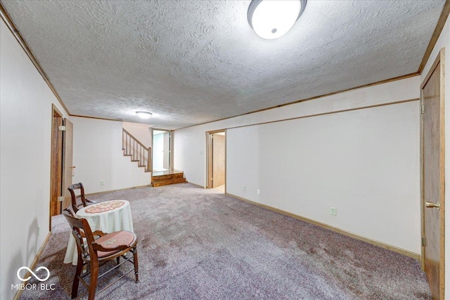 11 N Restin Rd, Greenwood, IN 46142 - finished basement featuring carpet flooring, stairway, a textured ceiling, and crown molding