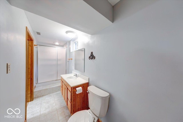 11 N Restin Rd, Greenwood, IN 46142 - bathroom featuring vanity, a shower stall, and tile patterned floors