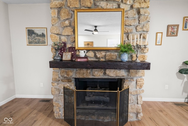 121 Hooton Blvd, Madison, IN 47250 - detailed view of wood finished floors, a ceiling fan, and a fireplace
