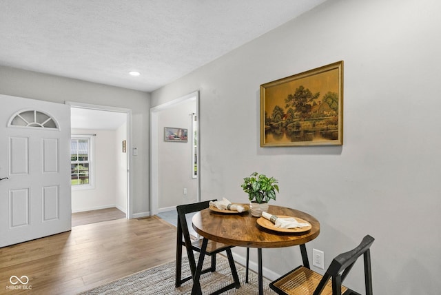 121 Hooton Blvd, Madison, IN 47250 - dining area featuring light wood finished floors, a textured ceiling, and recessed lighting