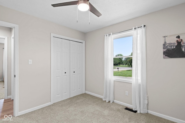 121 Hooton Blvd, Madison, IN 47250 - unfurnished bedroom featuring a closet, carpet, and ceiling fan