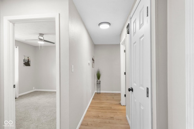 121 Hooton Blvd, Madison, IN 47250 - hallway featuring baseboards and light wood finished floors