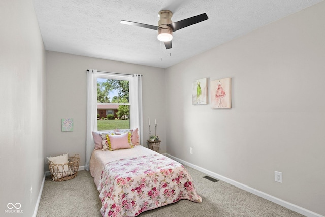 121 Hooton Blvd, Madison, IN 47250 - carpeted bedroom featuring a textured ceiling and a ceiling fan