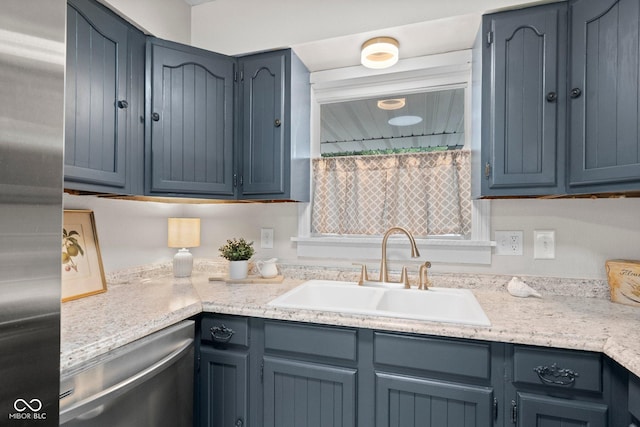121 Hooton Blvd, Madison, IN 47250 - kitchen featuring stainless steel appliances, light countertops, and blue cabinetry