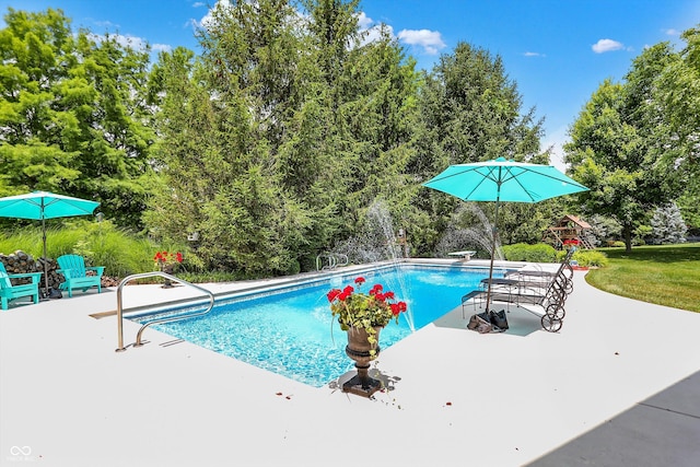 4704 Pearcrest Way, Greenwood, IN 46143 - outdoor pool featuring a patio, a diving board, and view of scattered trees