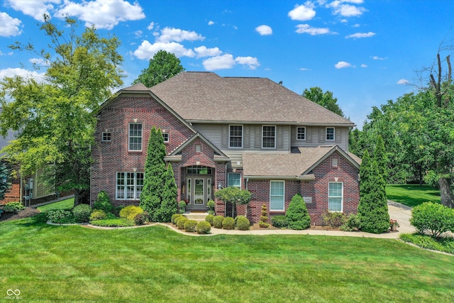 4704 Pearcrest Way, Greenwood, IN 46143 - traditional-style home with brick siding, a front lawn, and a shingled roof