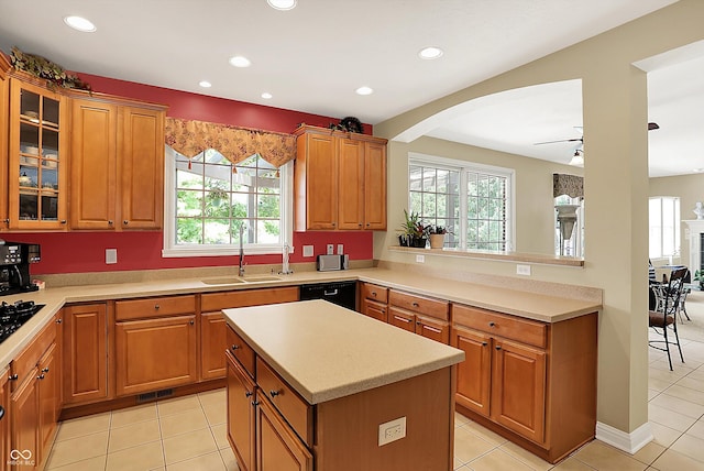 4704 Pearcrest Way, Greenwood, IN 46143 - kitchen with plenty of natural light, arched walkways, glass insert cabinets, and recessed lighting