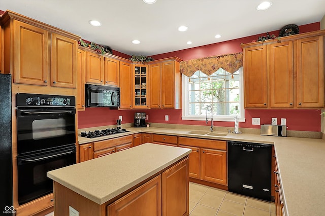 4704 Pearcrest Way, Greenwood, IN 46143 - kitchen featuring black appliances, light countertops, recessed lighting, light tile patterned flooring, and glass insert cabinets
