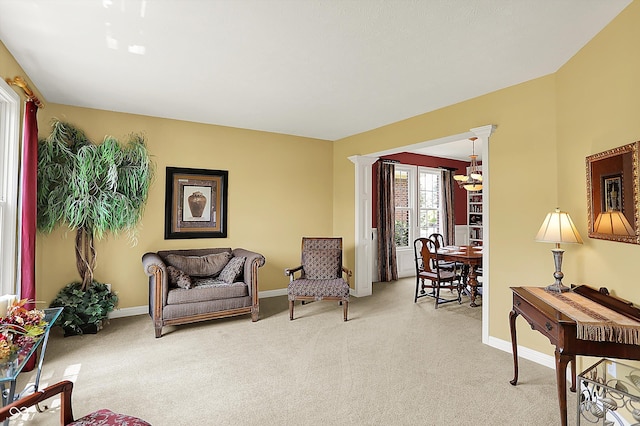 4704 Pearcrest Way, Greenwood, IN 46143 - living area with light carpet and a chandelier