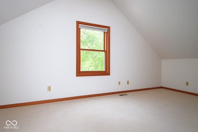 3363 Paddington Dr, Columbus, IN 47203 - additional living space with lofted ceiling and carpet floors