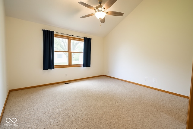 3363 Paddington Dr, Columbus, IN 47203 - empty room featuring lofted ceiling, carpet floors, and ceiling fan