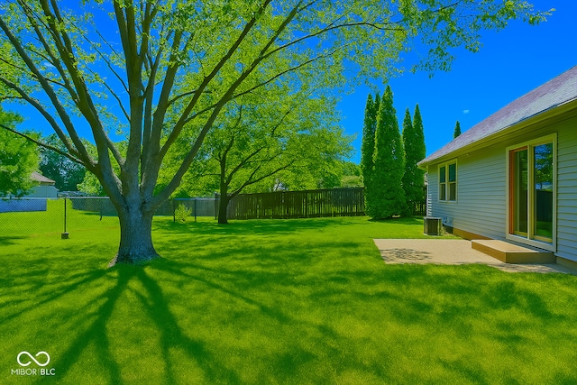 3363 Paddington Dr, Columbus, IN 47203 - fenced backyard featuring a patio area