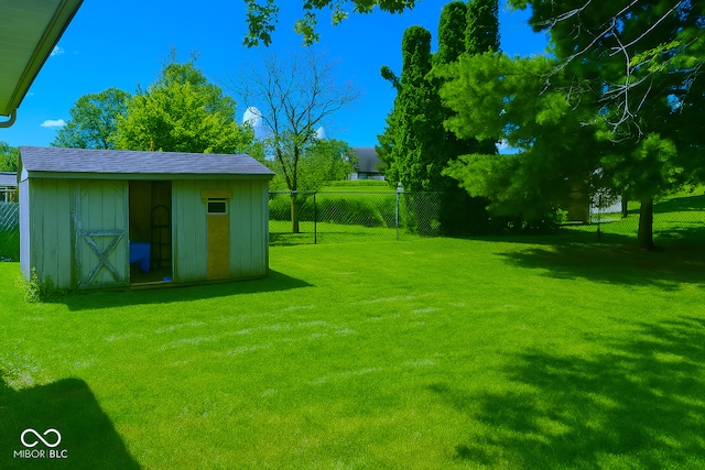 3363 Paddington Dr, Columbus, IN 47203 - view of yard featuring a storage unit