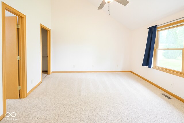 3363 Paddington Dr, Columbus, IN 47203 - spare room with lofted ceiling, carpet flooring, and a ceiling fan
