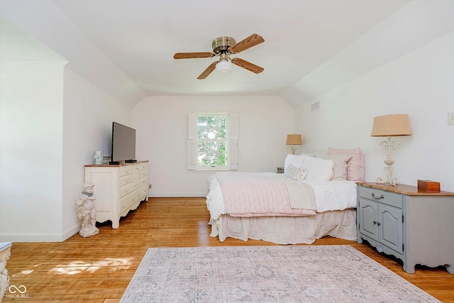 6280 N Chester Ave, Indianapolis, IN 46220 - bedroom with lofted ceiling, light wood finished floors, and ceiling fan