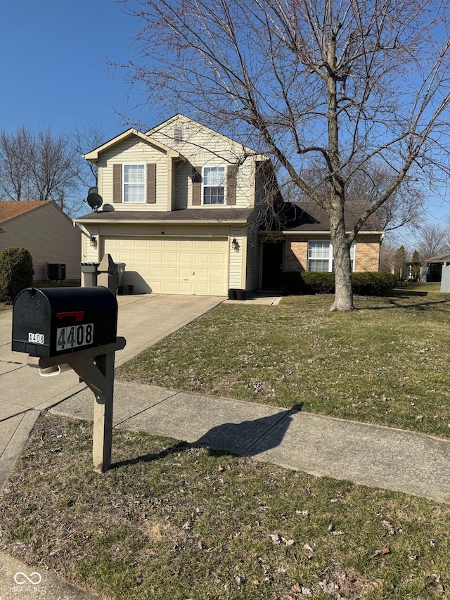 4408 Vestry Pl, Indianapolis, IN 46237 - view of front of property with a garage, concrete driveway, and a front yard