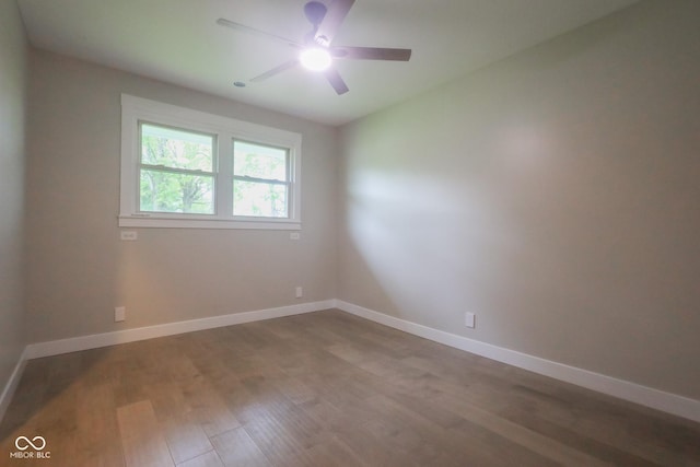 7300 N Banta Rd, Bargersville, IN 46106 - spare room with wood finished floors and a ceiling fan