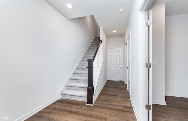 14514 Hanford Ln, Carmel, IN 46074 - stairs featuring wood finished floors and recessed lighting