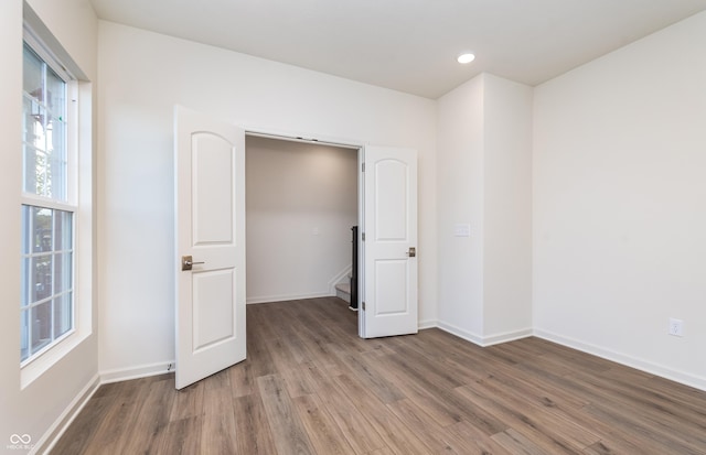 14514 Hanford Ln, Carmel, IN 46074 - spare room featuring wood finished floors and baseboards