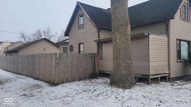1508 N Morrison St, Kokomo, IN 46901 - snow covered property with a chimney and a shingled roof