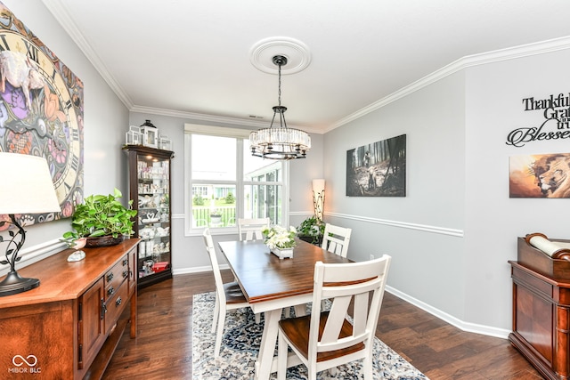 13427 Merryvale St, Fishers, IN 46037 - dining room featuring crown molding, a chandelier, and dark wood-style floors
