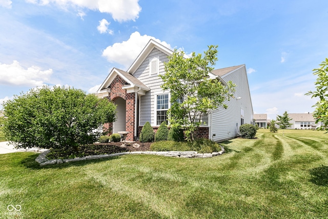 13427 Merryvale St, Fishers, IN 46037 - view of front facade with brick siding and a front yard