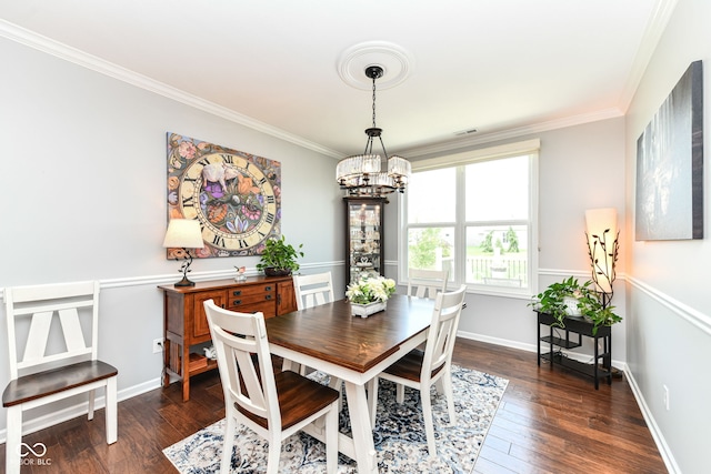 13427 Merryvale St, Fishers, IN 46037 - dining room featuring a chandelier, ornamental molding, and dark wood-style floors