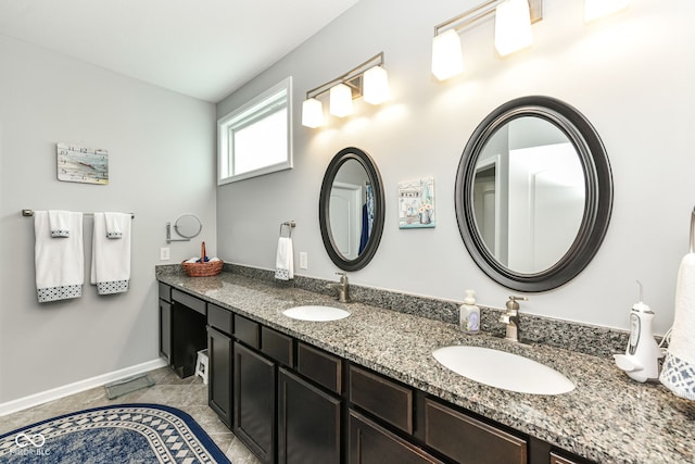 13427 Merryvale St, Fishers, IN 46037 - full bath featuring baseboards and double vanity