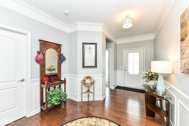 13427 Merryvale St, Fishers, IN 46037 - foyer with a wainscoted wall, crown molding, wood-type flooring, and a decorative wall
