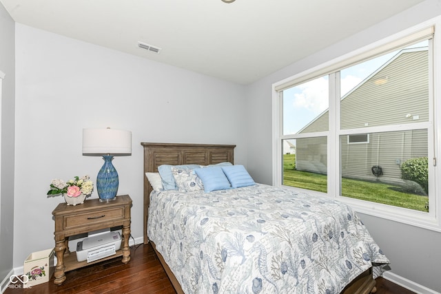 13427 Merryvale St, Fishers, IN 46037 - bedroom with dark wood-type flooring and baseboards