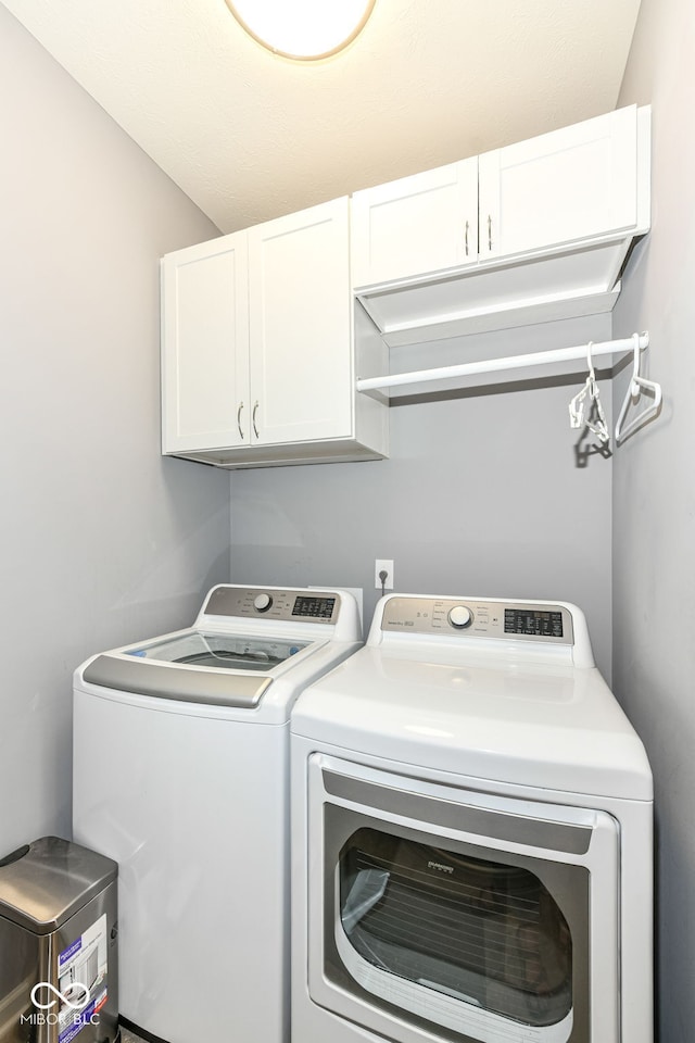 13427 Merryvale St, Fishers, IN 46037 - laundry room featuring cabinet space and separate washer and dryer