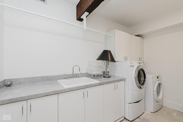 1616 W 116th St, Carmel, IN 46032 - washroom featuring cabinet space and washing machine and dryer