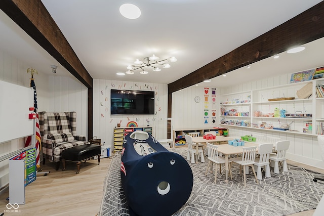 1616 W 116th St, Carmel, IN 46032 - rec room featuring wood finished floors, beamed ceiling, and a chandelier