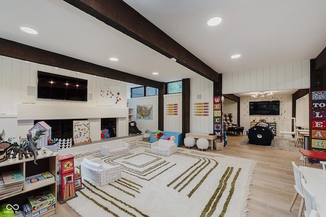 1616 W 116th St, Carmel, IN 46032 - living area with beam ceiling, wood finished floors, a fireplace, and recessed lighting