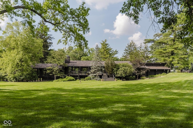 1616 W 116th St, Carmel, IN 46032 - view of grassy yard featuring a deck