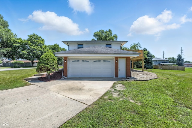 1011 Robin Dr, Anderson, IN 46013 - traditional-style home featuring concrete driveway, a front lawn, brick siding, and a shingled roof