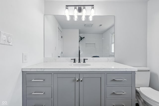 1011 Robin Dr, Anderson, IN 46013 - bathroom with vanity and a tile shower