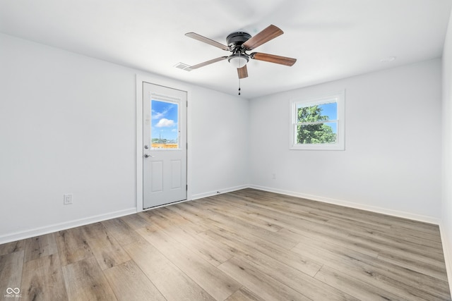1011 Robin Dr, Anderson, IN 46013 - empty room featuring wood finished floors and a ceiling fan
