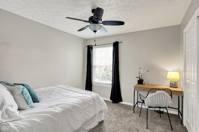 6298 Briargate Dr, Zionsville, IN 46077 - bedroom with carpet, a textured ceiling, and a ceiling fan