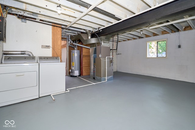 2606 Shakespeare Dr, Southport, IN 46227 - below grade area featuring water heater, washer and dryer, heating unit, and concrete block wall