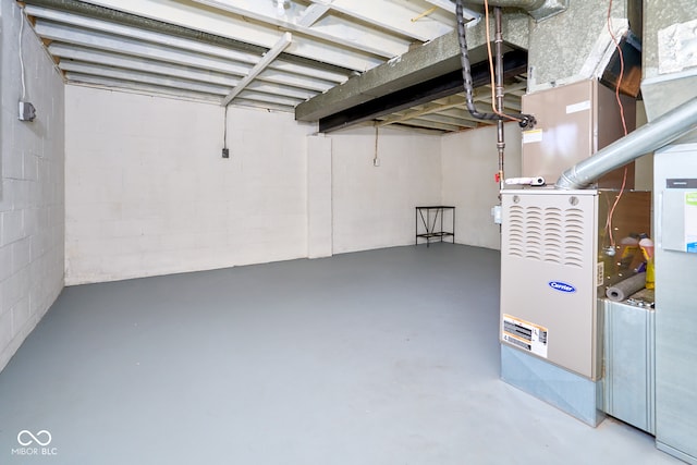 2606 Shakespeare Dr, Southport, IN 46227 - unfinished basement with heating unit
