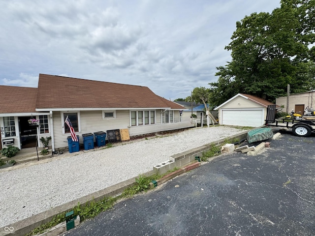 205 N Jackson St, Greencastle, IN 46135 - view of front of home with a detached garage and an outdoor structure