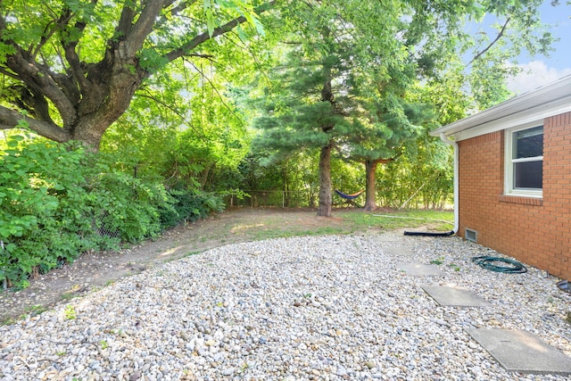 1231 N Graham Ave, Indianapolis, IN 46219 - view of yard with a patio area