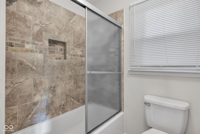 1231 N Graham Ave, Indianapolis, IN 46219 - bathroom featuring combined bath / shower with glass door and toilet
