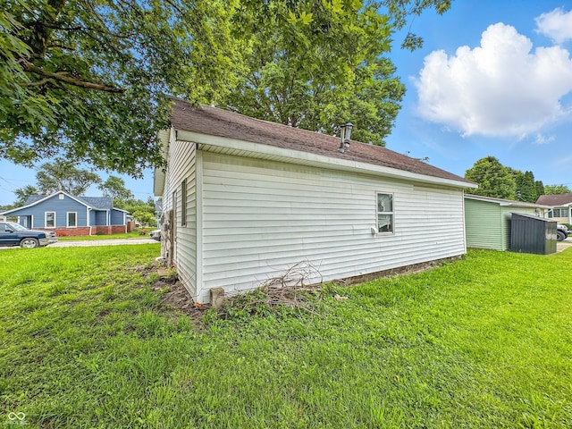 356 S 7th St, Frankfort, IN 46041 - view of home's exterior with a lawn